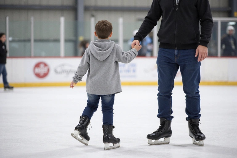 A beginner ice skater learning to balance on the ice.